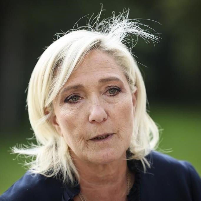 France's Le Pen denies wrongdoing as she and her party go on trial accused of embezzling EU funds